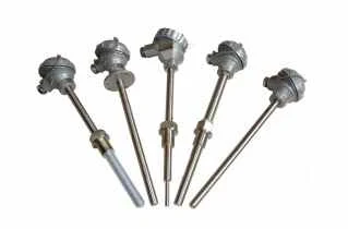 Five temperature probes with connection heads and mounting fittings.